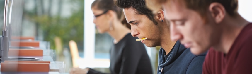 People entering data into computers