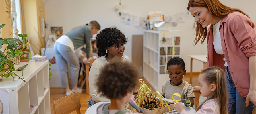 A stock image of young children in a kindergarden
